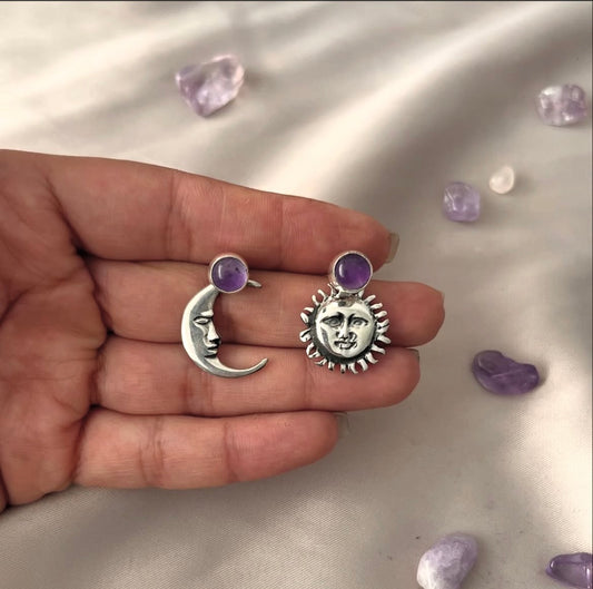 Aretes día y noche.
